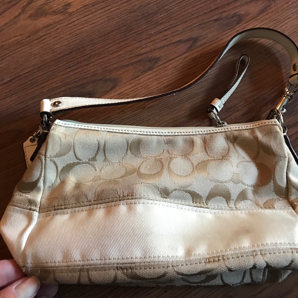 Small CreamCoach Purse.